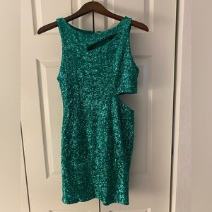 Bebe. Size Medium. Sparkling green. Sequin mini dress.